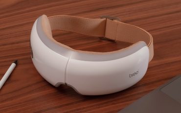 Zuky HUB Self-Care Essentials: Smart electric eye massager for stress relief and relaxation on a modern wood desk. Premium wellness gadgets and health tech.